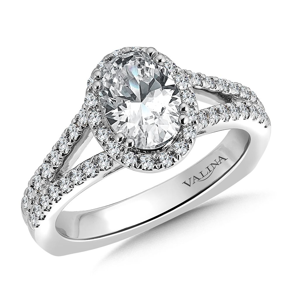 https://harrisons.ecomdev.in.net/classics/halo-style-engagement-ring/